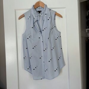 Ann Taylor Light Blue Sleeveless Blouse with Small Black Floral Pattern